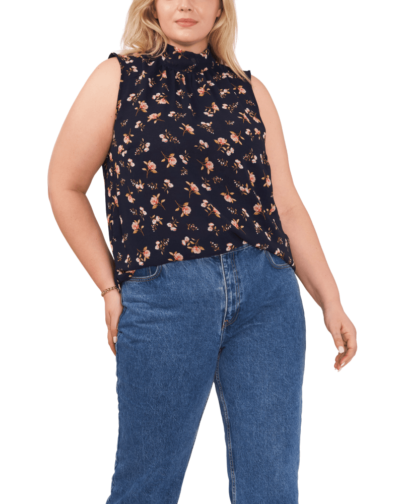 Front of a model wearing a size 0X Ameilia Mockneck Top in FLRL TWLGHT BLU by 1.State. | dia_product_style_image_id:262380